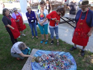 Mosaic artists from SAMA 2014 ready to install panels at Smither Park