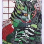 green cat mosaic by Lynn Bridge of Glencliff Art Studio in Austin, Texas, U.S.A.
