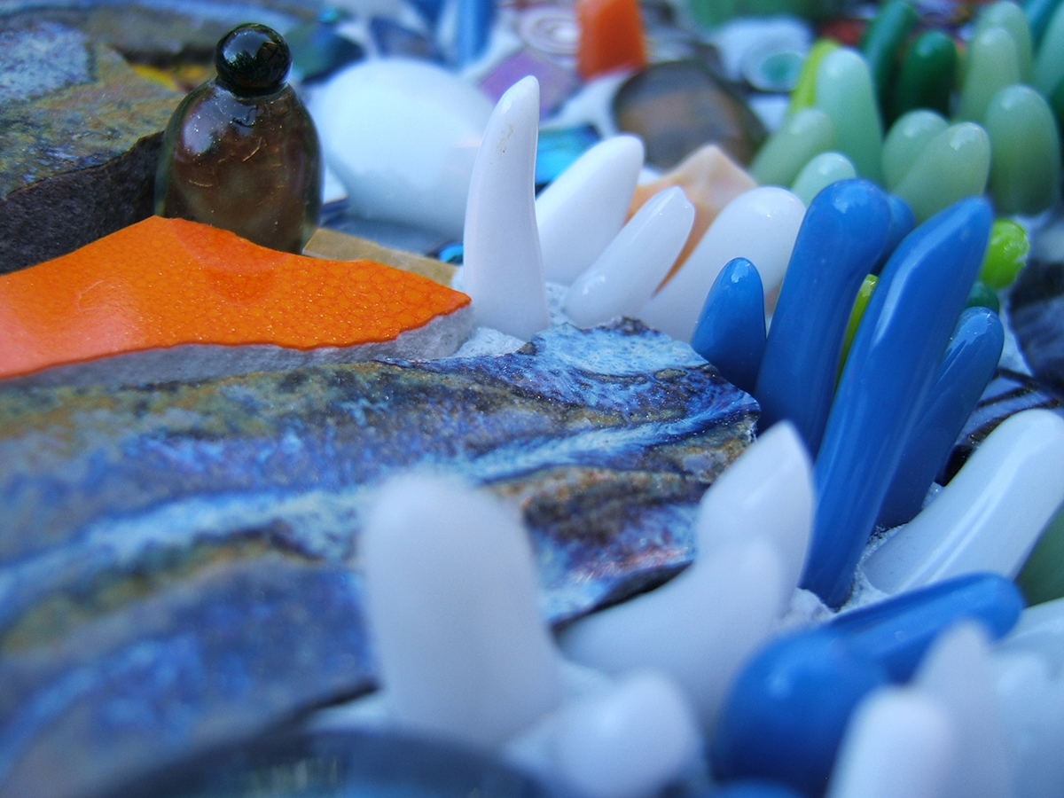 detail of a blue mosaic fine art plate made by Lynn Bridge