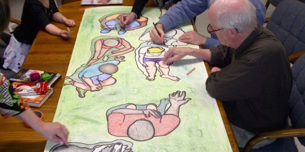 coloring the design for the third panel of The Feeding of the 5000, designed by Lynn Bridge