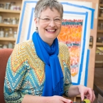 Nina Miller's photographic portrait of Lynn Bridge in her mosaic studio in Austin, Texas