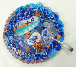 blue and orange mosaic plate made by Lynn Bridge, Austin, Texas mosaic artist